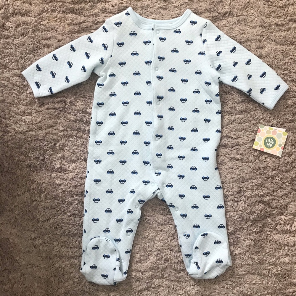 Light blue footed onesie with car print
